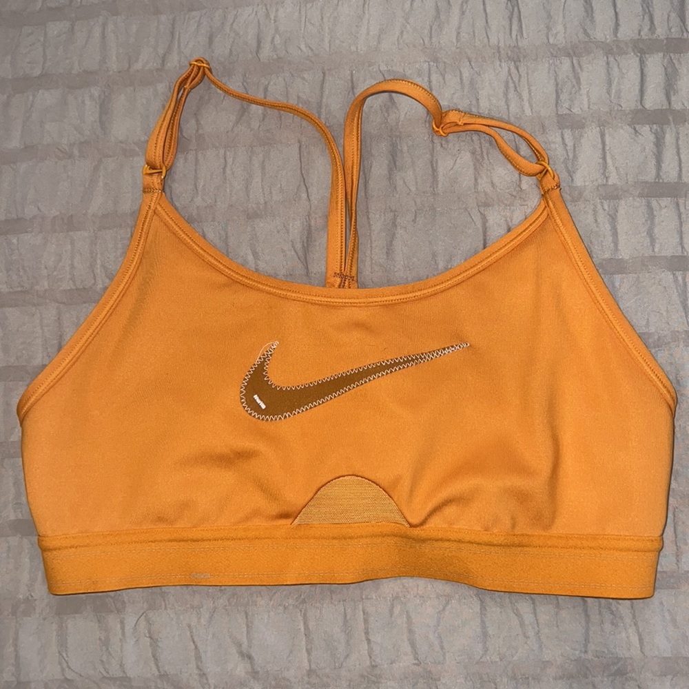Orange Nike sports bra revolve